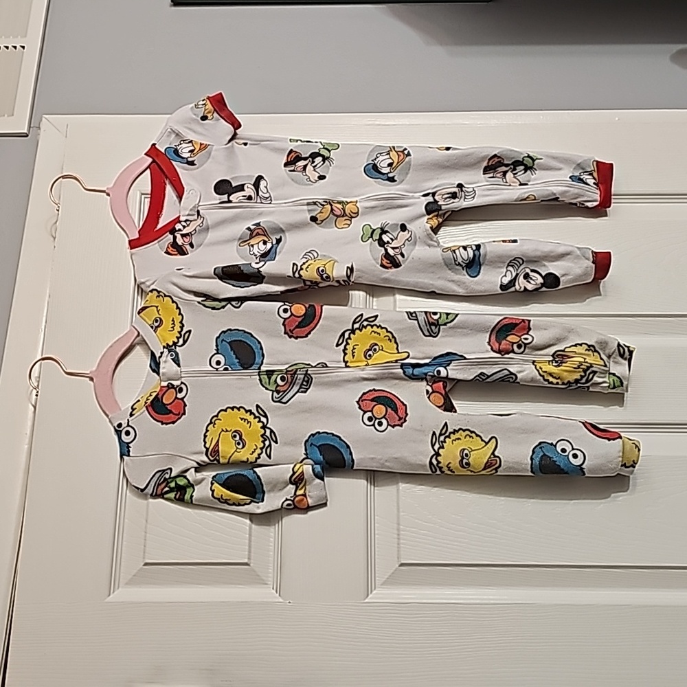 2 for $15  Sesame Stree 18m t pajama set 1 long sleeve and 1 short sleeve.